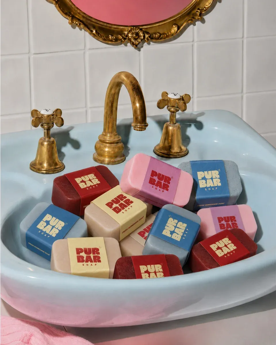 PUR BAR soaps in their wrappers, arranged together